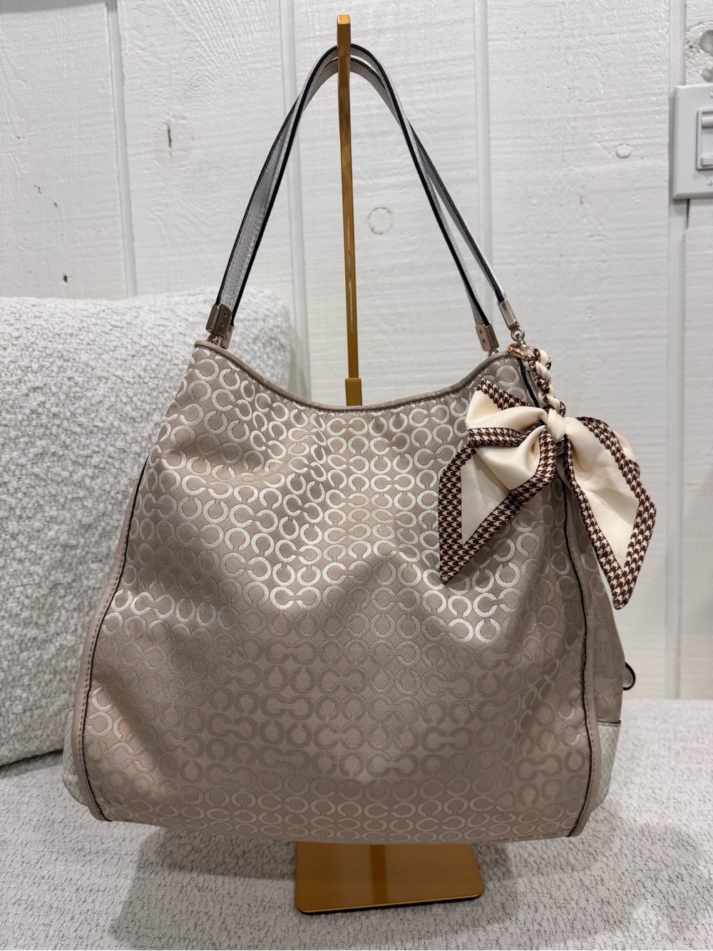 a vintage Coach Madison Op Art Pearl Phoebe Shoulder Bag.